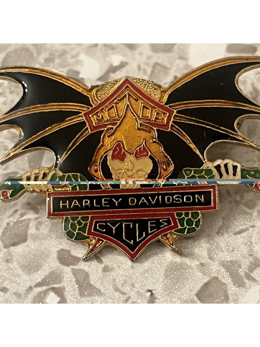 Harley Davidson Vintage Bat Wing Skull Holding Snake Handle Bars Enamel 2" Pin